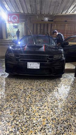 دۆج چارجەر